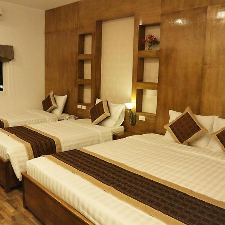 V Central Hotel Vang Vieng Bagian luar foto